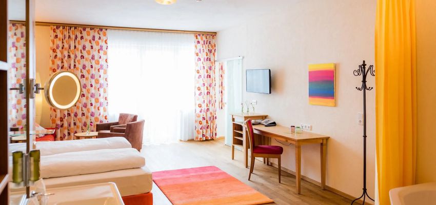 Spacious family suite with balcony and separate children's room, Hotel Walserberg